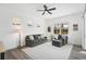 Relaxing living room with comfortable seating and a view to the backyard at 12353 Auburndale Ct, Venice, FL 34293