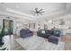 Spacious living room with hardwood floors and open floor plan at 12353 Auburndale Ct, Venice, FL 34293