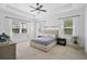 Main bedroom with neutral decor and ample natural light at 12353 Auburndale Ct, Venice, FL 34293