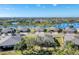 Aerial view of waterfront community with single-Gathering homes at 13542 Abercrombie Dr, Englewood, FL 34223