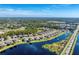 Bird's-eye view of community and lake at 13542 Abercrombie Dr, Englewood, FL 34223