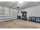 Garage with storage shelving and bicycle at 13542 Abercrombie Dr, Englewood, FL 34223