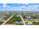 Aerial view of home and neighborhood at 14098 Baracoa Ln, Port Charlotte, FL 33981