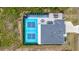 Top-down view of house, pickleball court, and yard at 14098 Baracoa Ln, Port Charlotte, FL 33981