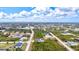 Aerial view of house and surrounding area at 14098 Baracoa Ln, Port Charlotte, FL 33981