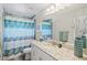 Clean bathroom with a shower/tub combo and granite vanity at 14098 Baracoa Ln, Port Charlotte, FL 33981