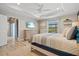 Bright bedroom with large windows and a king-size bed at 14098 Baracoa Ln, Port Charlotte, FL 33981