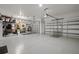 Large garage with shelving and plenty of storage space at 14098 Baracoa Ln, Port Charlotte, FL 33981