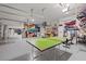 Spacious garage with ping pong table and storage solutions at 14098 Baracoa Ln, Port Charlotte, FL 33981