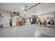 Spacious garage with ample storage and workbench at 14098 Baracoa Ln, Port Charlotte, FL 33981