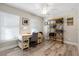 Comfortable home office with a large window, desk, and shelving unit, perfect for remote work at 14098 Baracoa Ln, Port Charlotte, FL 33981