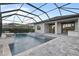 Resort-style pool and spa with covered lanai at 14454 Little Eagle Loop, Nokomis, FL 34275