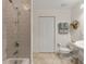 Clean bathroom with tub, toilet and linen closet at 157 Tampa E Ave # 208, Venice, FL 34285