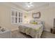 Spacious bedroom with king-size bed and plantation shutters at 157 Tampa E Ave # 208, Venice, FL 34285