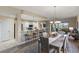 Open concept dining area with kitchen access at 157 Tampa E Ave # 208, Venice, FL 34285