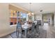 Elegant dining room with large window and hardwood floors at 157 Tampa E Ave # 208, Venice, FL 34285