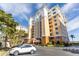 Multi-story building exterior with parking at 157 Tampa E Ave # 208, Venice, FL 34285