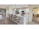 Modern kitchen with white cabinets and island at 157 Tampa E Ave # 208, Venice, FL 34285