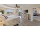 Serene main bedroom with water views and large windows at 157 Tampa E Ave # 208, Venice, FL 34285