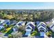 Aerial view of houses near a lake at 1584 Monarch Dr, Venice, FL 34293