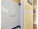 Shower with white tiles and grab bar at 1584 Monarch Dr, Venice, FL 34293