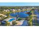 Community pool with lake view at 1584 Monarch Dr, Venice, FL 34293