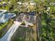 Aerial view of single-Gathering home with pool at 1684 Ruiz St, North Port, FL 34286