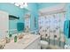 Charming bathroom with a seashell theme and shower/tub combo at 1684 Ruiz St, North Port, FL 34286