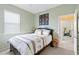Bright bedroom with a double bed and access to a home gym at 1684 Ruiz St, North Port, FL 34286