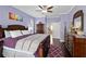Spacious Primary bedroom with large bed, dresser, and ensuite bathroom access at 1684 Ruiz St, North Port, FL 34286