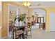 Breakfast nook with table and chairs, offering view to living room at 1684 Ruiz St, North Port, FL 34286