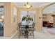 Bright breakfast nook with table and chairs, near sliding doors at 1684 Ruiz St, North Port, FL 34286