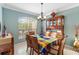 Charming dining room with a colorful table setting at 1684 Ruiz St, North Port, FL 34286