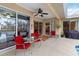 Relaxing patio with seating for four and a view of the pool at 1684 Ruiz St, North Port, FL 34286
