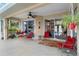 Relaxing patio with seating for four and a view of the pool at 1684 Ruiz St, North Port, FL 34286