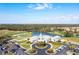 Beautiful aerial view of Pelican Pointe Golf & Country Club, showing lush greenery and surrounding community at 1721 Dogleg Dr, Venice, FL 34285