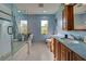 Clean bathroom with a large vanity and tiled shower/tub combo at 1723 N Gondola Ct, Venice, FL 34293