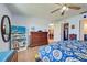 Bedroom with king bed, dresser, and access to closet and bath at 1723 N Gondola Ct, Venice, FL 34293