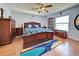 Spacious bedroom with king bed, ample furniture, and a view at 1723 N Gondola Ct, Venice, FL 34293