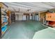 Large garage with ample storage and space for multiple vehicles at 1723 N Gondola Ct, Venice, FL 34293