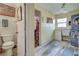 Laundry room with washer, dryer, sink and additional storage at 1723 N Gondola Ct, Venice, FL 34293