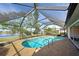 Enjoyable pool and screened patio area with lake view at 1723 N Gondola Ct, Venice, FL 34293
