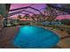 Enjoy breathtaking sunset views from this screened pool area at 1723 N Gondola Ct, Venice, FL 34293