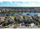 Aerial view highlighting home's waterfront location and community at 19374 Rizzuto St, Venice, FL 34293