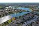 Wide aerial view of the home and surrounding waterfront community at 19374 Rizzuto St, Venice, FL 34293