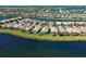 Bird's-eye view of home and community, highlighting waterfront access at 19374 Rizzuto St, Venice, FL 34293