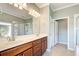 Bathroom boasts double vanity and walk-in shower at 19374 Rizzuto St, Venice, FL 34293