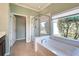 Spa-like bathroom with soaking tub and walk-in shower at 19374 Rizzuto St, Venice, FL 34293