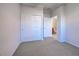 Bedroom with double door closet and bathroom access at 19374 Rizzuto St, Venice, FL 34293