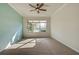 Bright bedroom with carpet and large windows offering water views at 19374 Rizzuto St, Venice, FL 34293